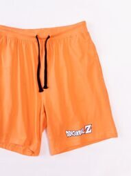 Шорты хлопковые с утягивающим шнурком в поясе/карманами цвет оранжевый с текстовым принтом размер XS Primark