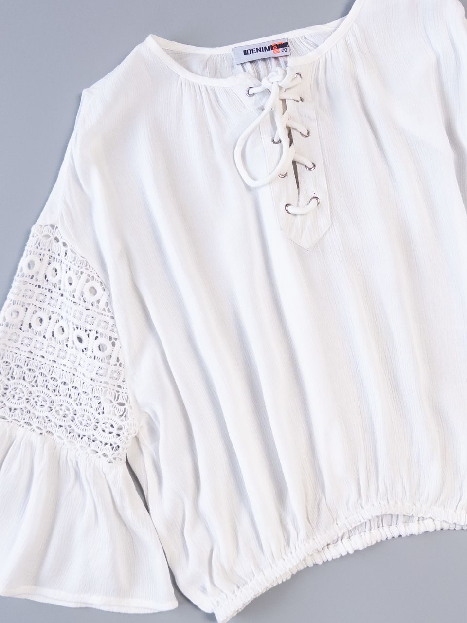 Блуза укороченная цвет белый с резинкой внизу размер EUR L (rus 48) KIABI