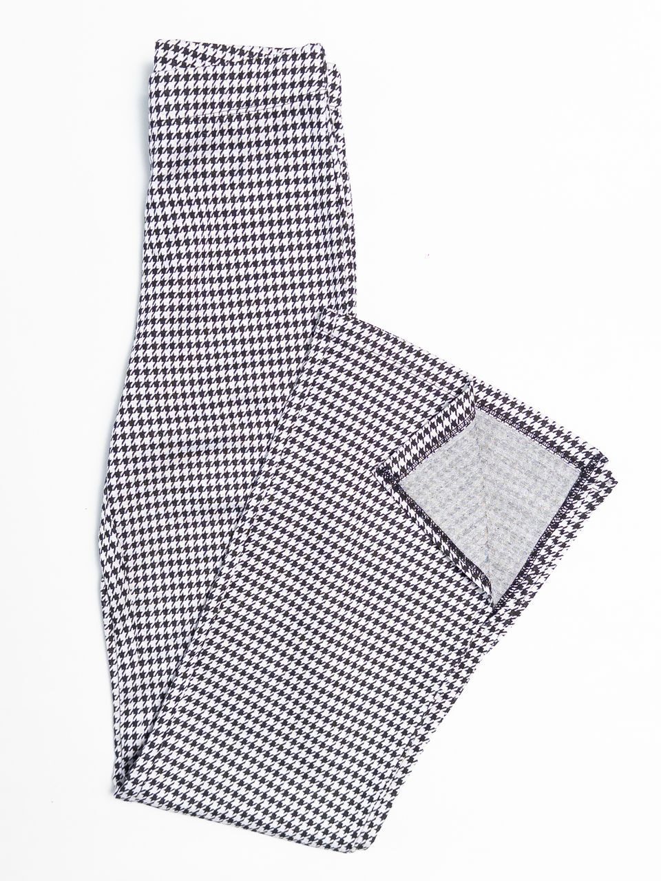 Брюки из плотного трикотажа женские расклешенные штанины с разрезом внизу цвет белый/черный принт гусиная лапка размер EUR 34 (rus 40) H&M